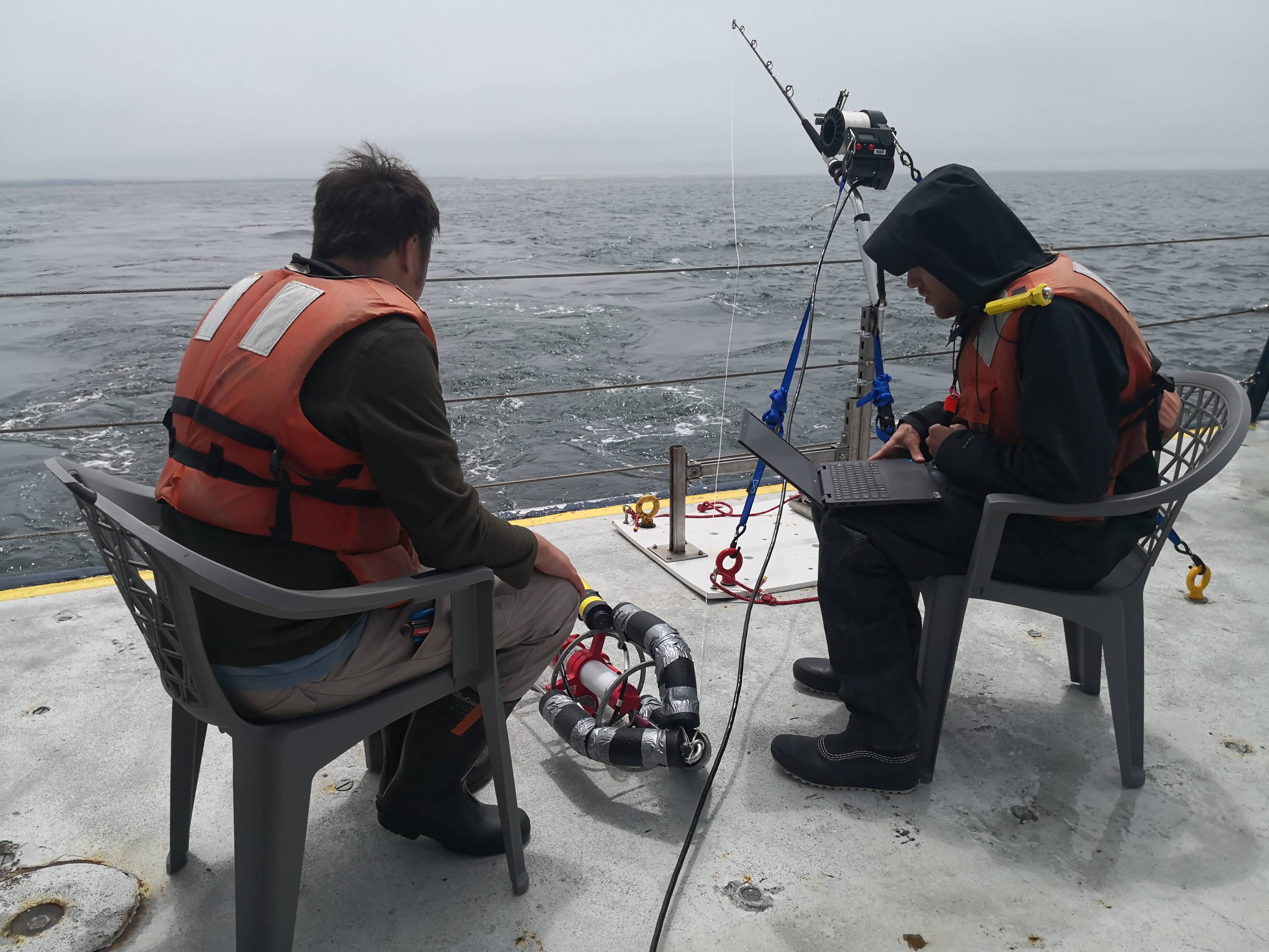 Students downloading data from an oceanographic instrument